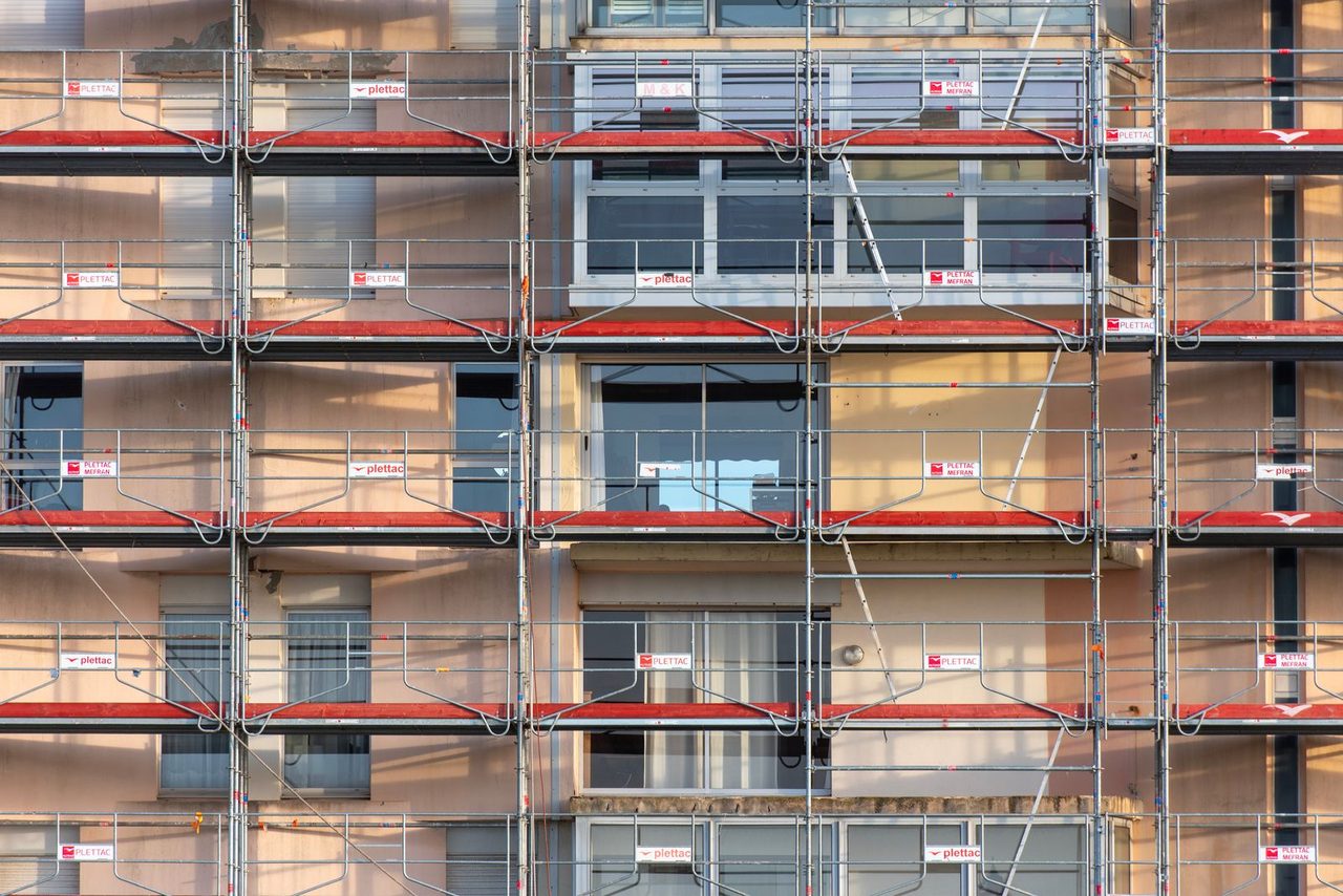 Full-elevation scaffold on a residential block during external wall works, M&K Carpentry (South), Croydon